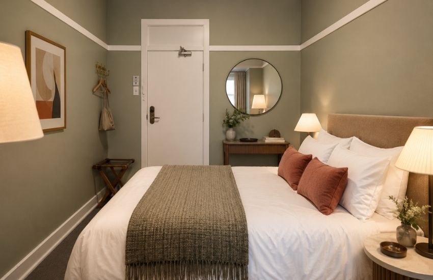 cozy bundanoon hotel room with sage walls and modern comfort