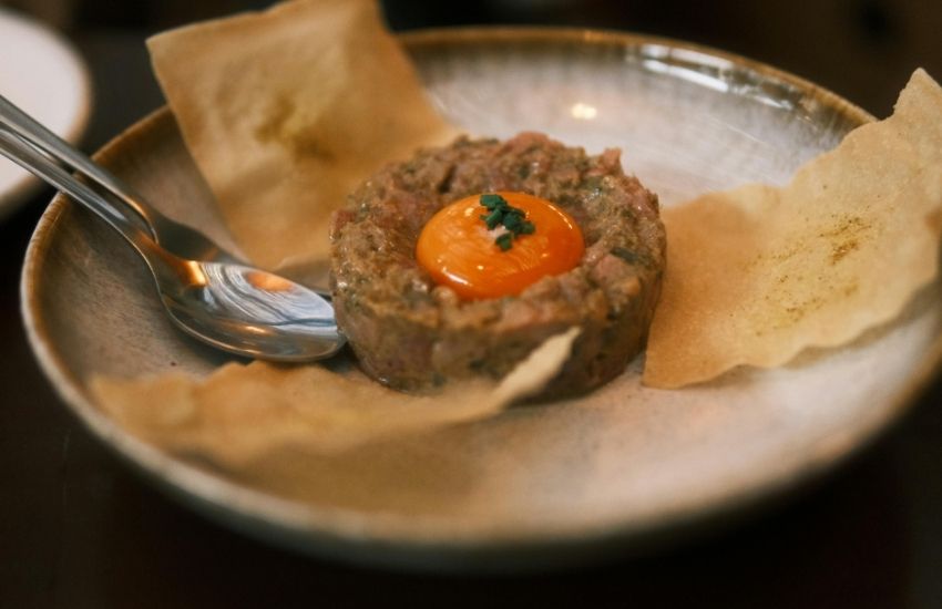 Delicious Beef Tartare with Egg Yolk in Lucette